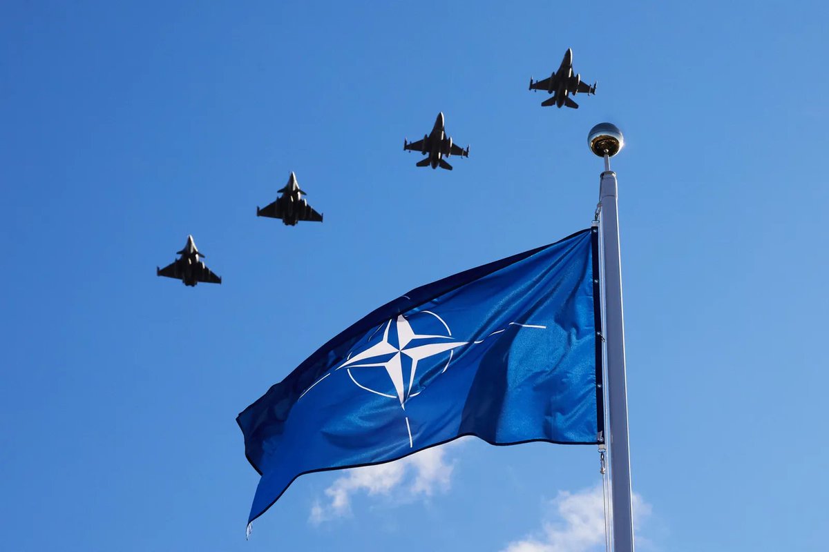 A flight of French and Polish Rafale and F-16 fighter jets above a NATO flag during the opening of the exhibition “Powerful because we are united”, dedicated to the 19th anniversary of Lithuania’s 2004 accession to NATO (OTD 22 years ago), in the bastion of the Vilnius defensive wall on March 29, 2023 (OTD 3 years ago) in Vilnius, Lithuania. (Photo by Oleg Nikishin/Getty Images)